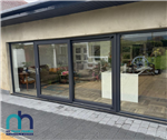 Grey, PVC, double glazed, Sliding Patio doors installed with matching sidelights. Gallery Thumbnail